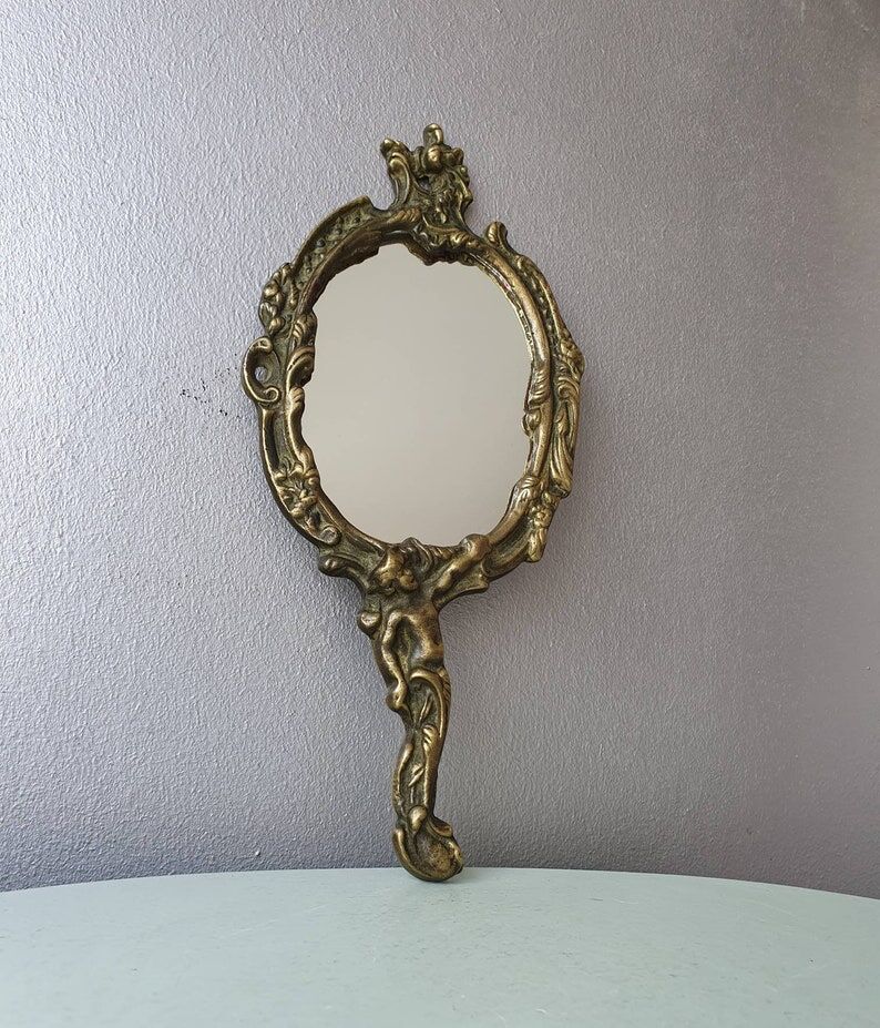 Hand mirror in brass art deco 30 years France