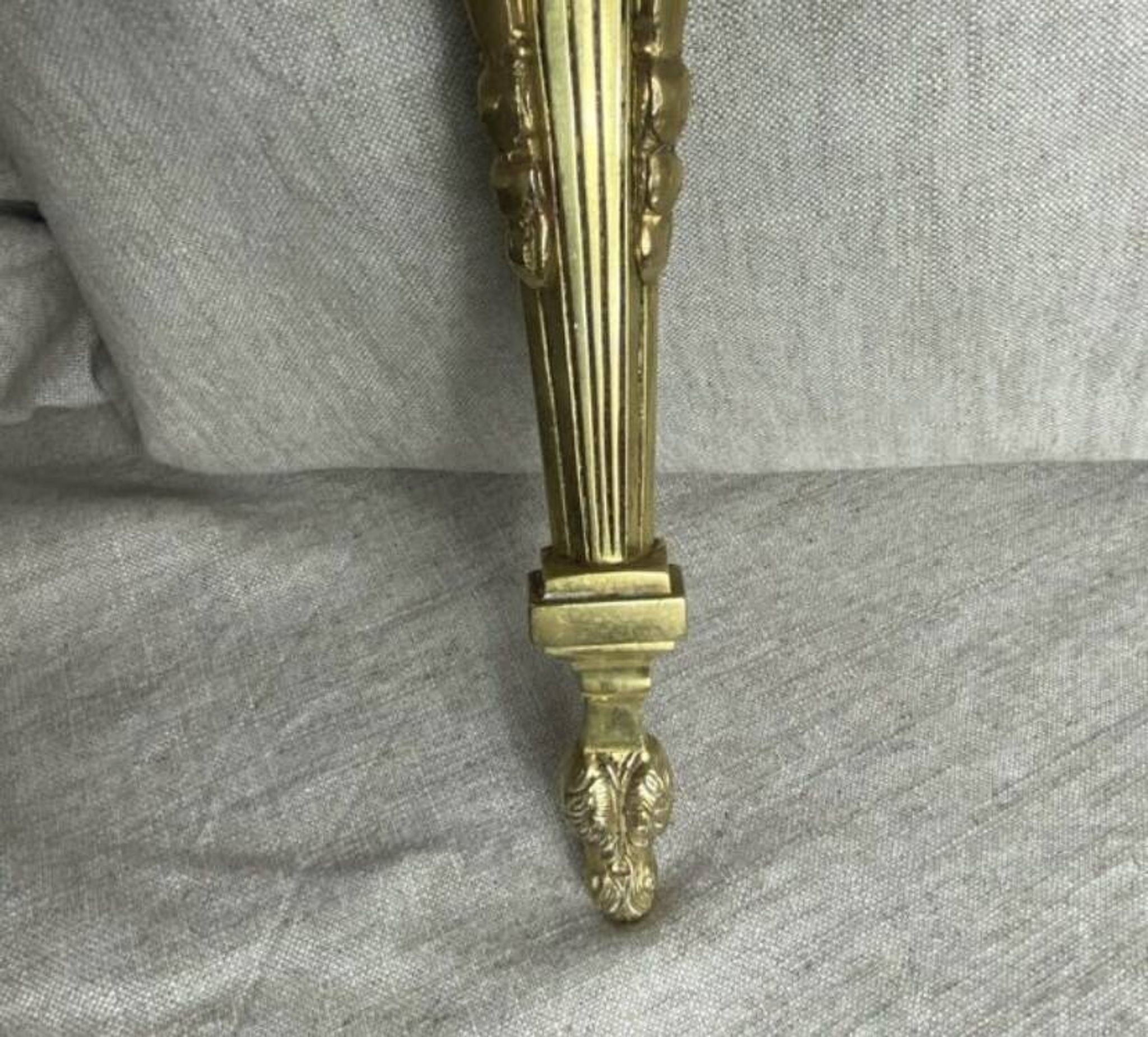 Pair of wall candle holders in bronze
