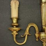 Pair of Louis XVI style quiver sconces in gilded bronze