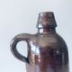 Bouteille antique avec anse