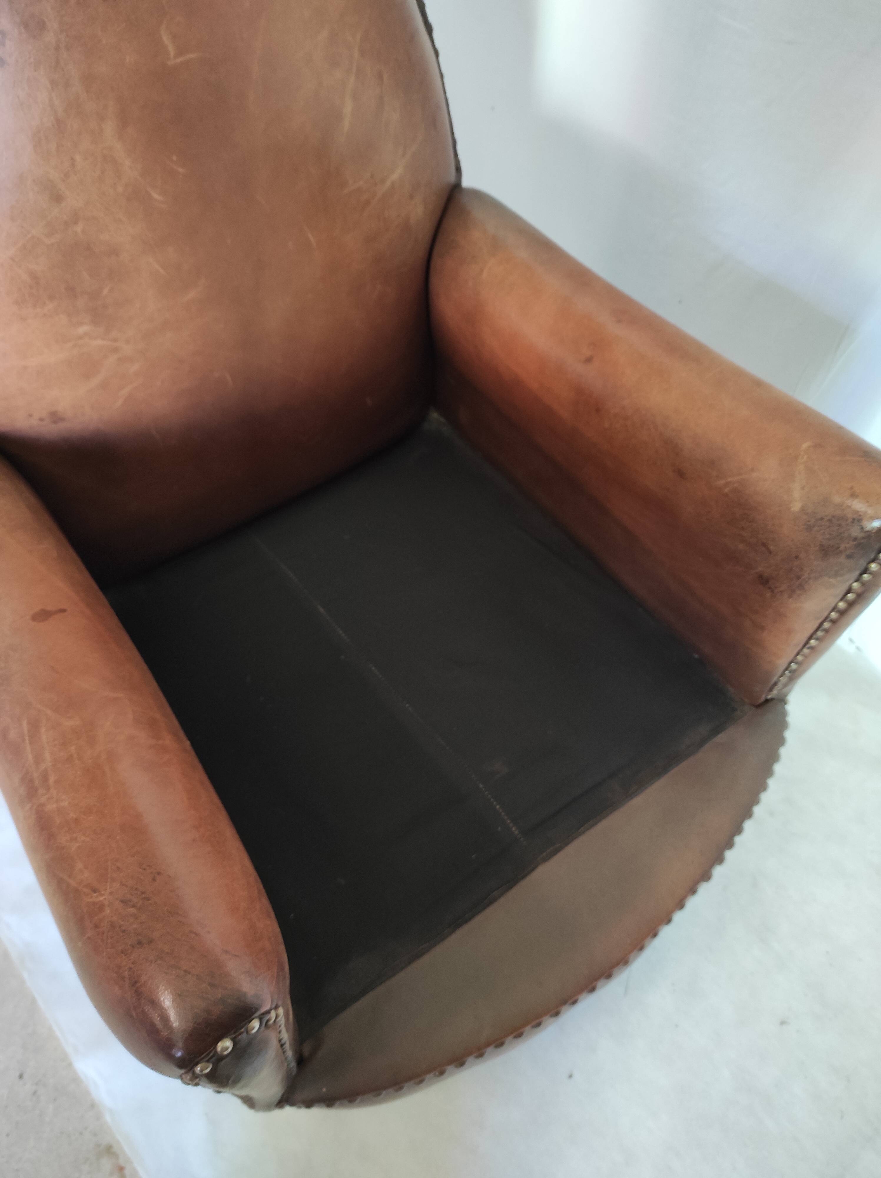Leather club chair model cathedral circa 1970