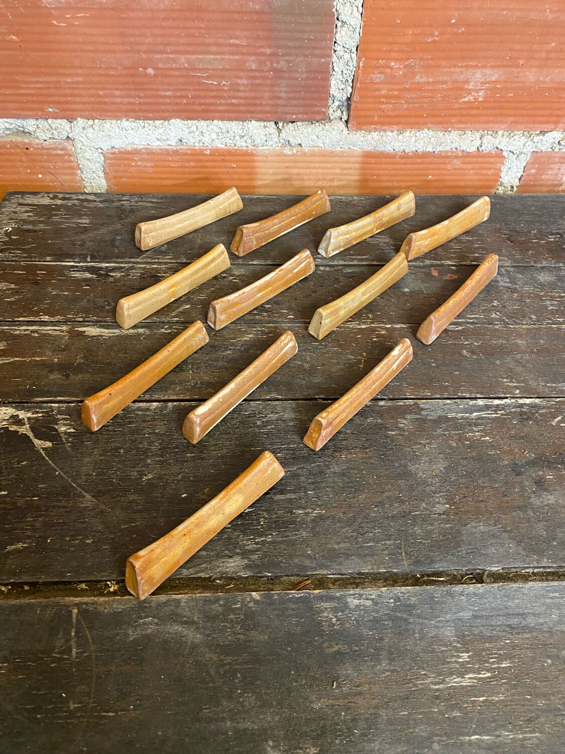 Set of 12 vintage stoneware knife rests