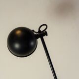 Minimalist articulated black floor lamp