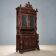 Antique neo-baroque display cabinet carved in walnut, Italy, 19th century