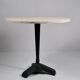 Vintage travertine bistro/dining table, solid metal base. (A)