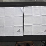 18 antique napkins in white linen with an embroidered geometric decoration