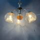 Vintage transparent glass chandelier from Murano with a chrome structure.