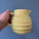 Old yellow pitcher Ste Amandinoise St Amand