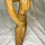 Wooden woman sculpture