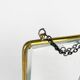 Old barber mirror in brass and beveled glass