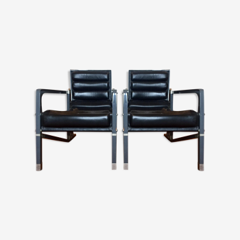 A pair of armchairs by Eileen Gray