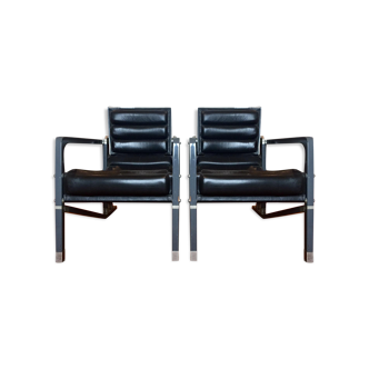 A pair of armchairs by Eileen Gray