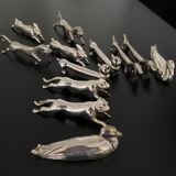 12 knife holders form various metal animals