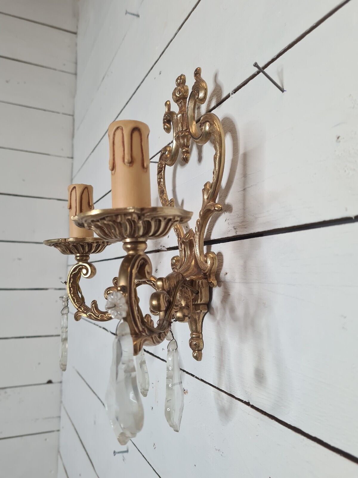 Louis XV style bronze wall lamp with tassels