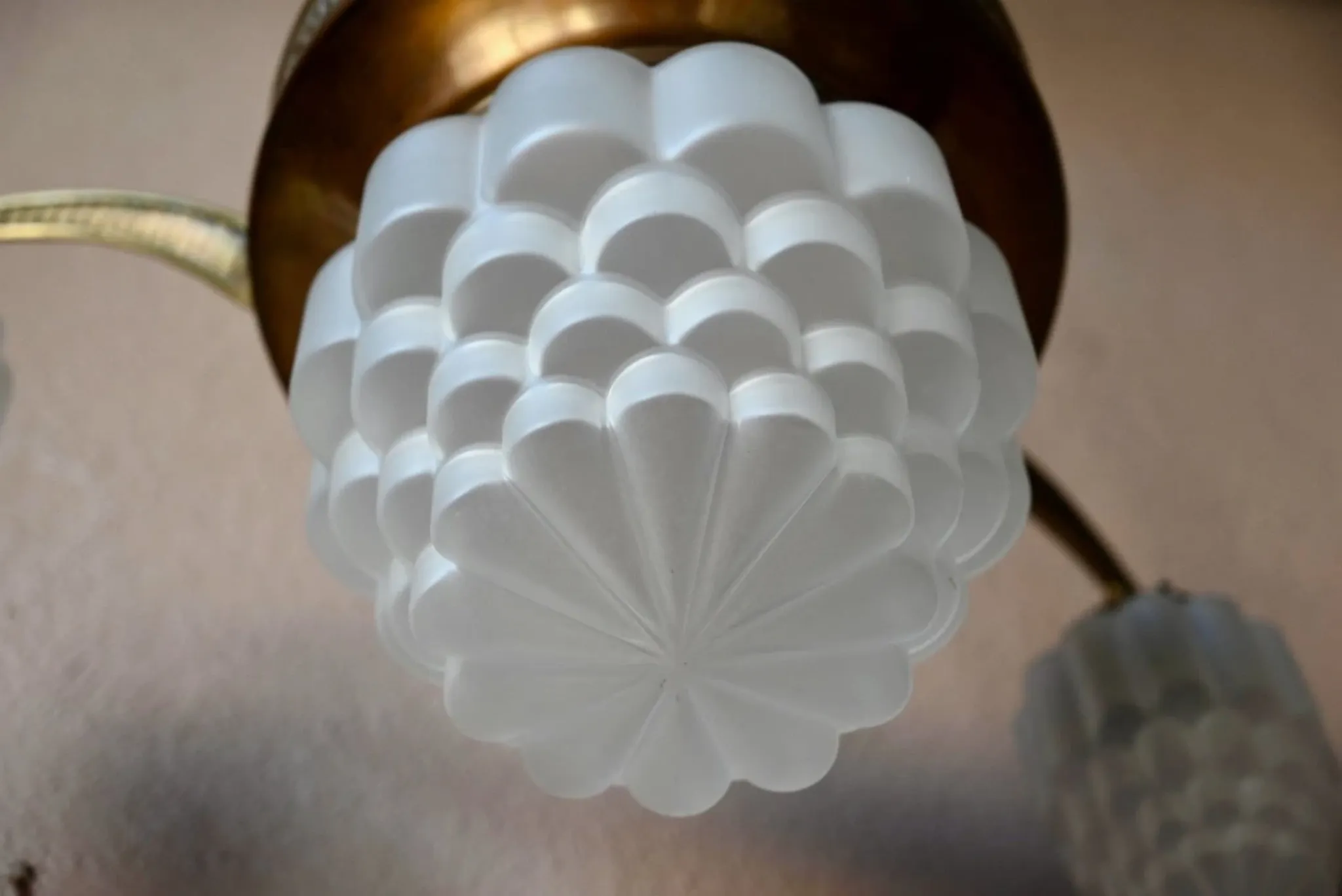 Art Deco lustre in brass and frosted pressed glass from the 1930s.