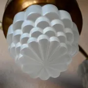 Art Deco lustre in brass and frosted pressed glass from the 1930s.