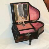 Box has jewelry a music