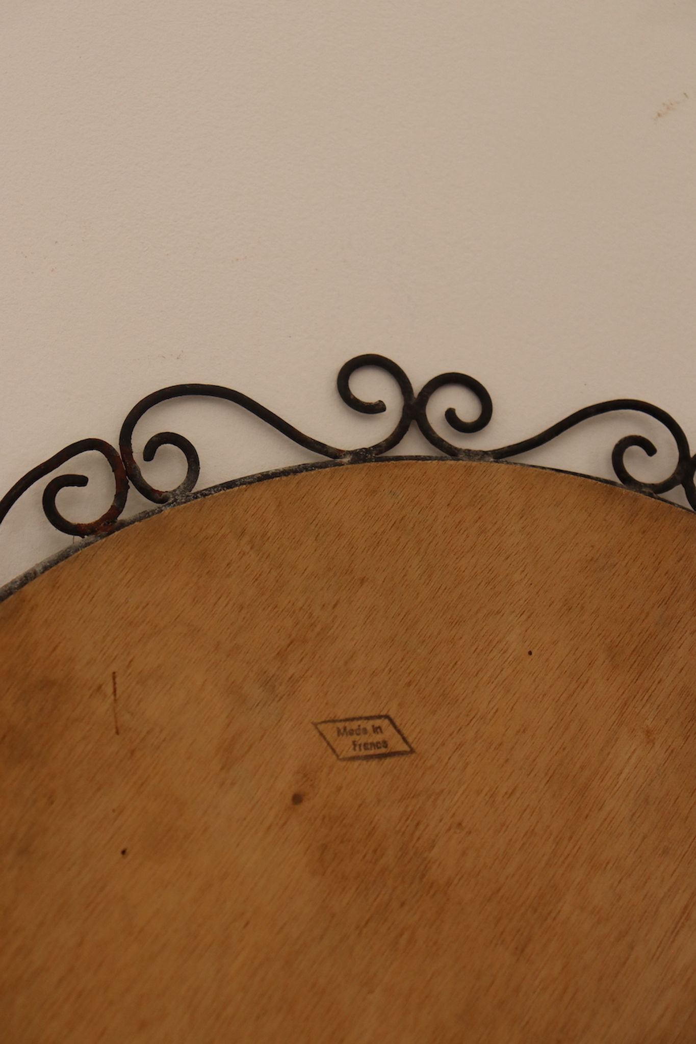 Round iron and rattan mirror