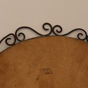 Round iron and rattan mirror