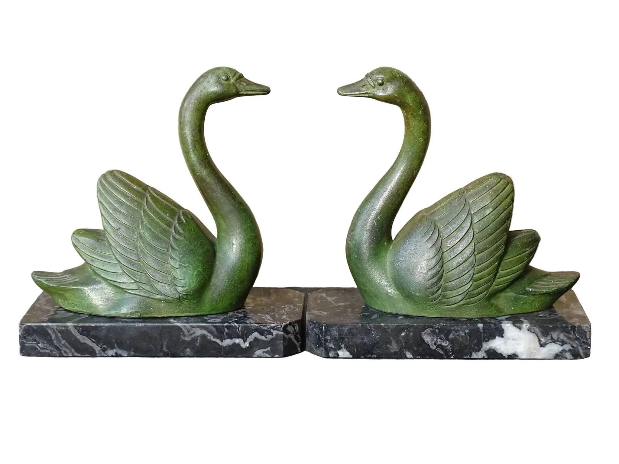 Vintage swan bookends on marble bases