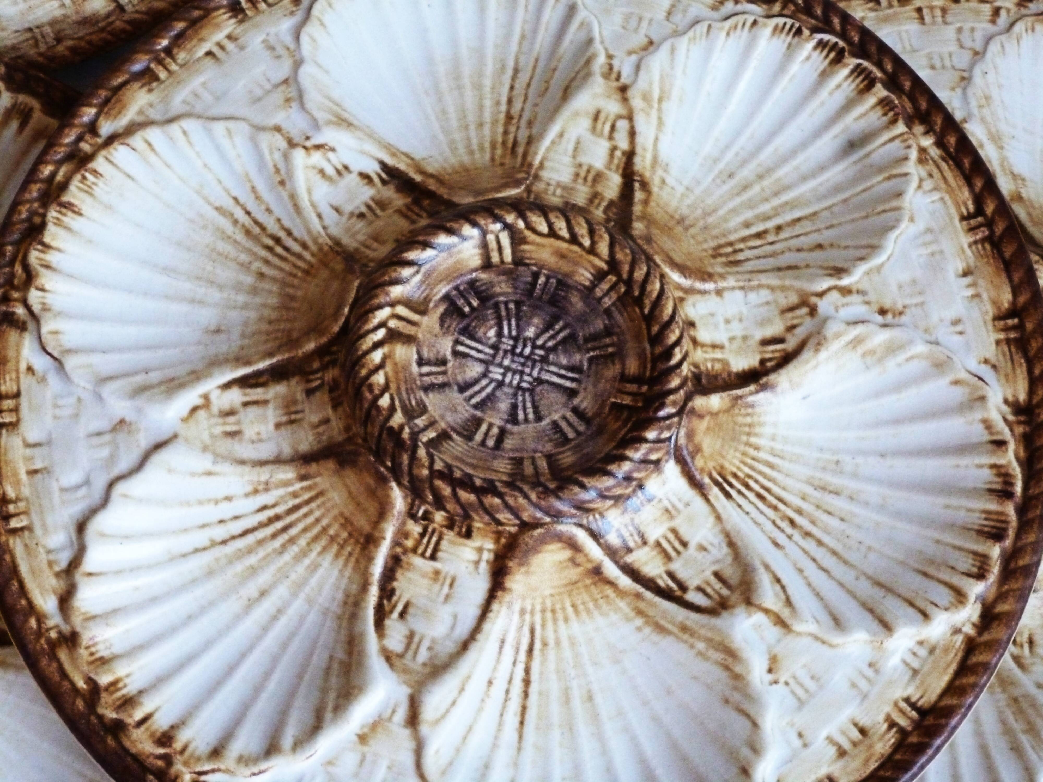 Oyster service, platter and 6 Longchamp oyster plates.