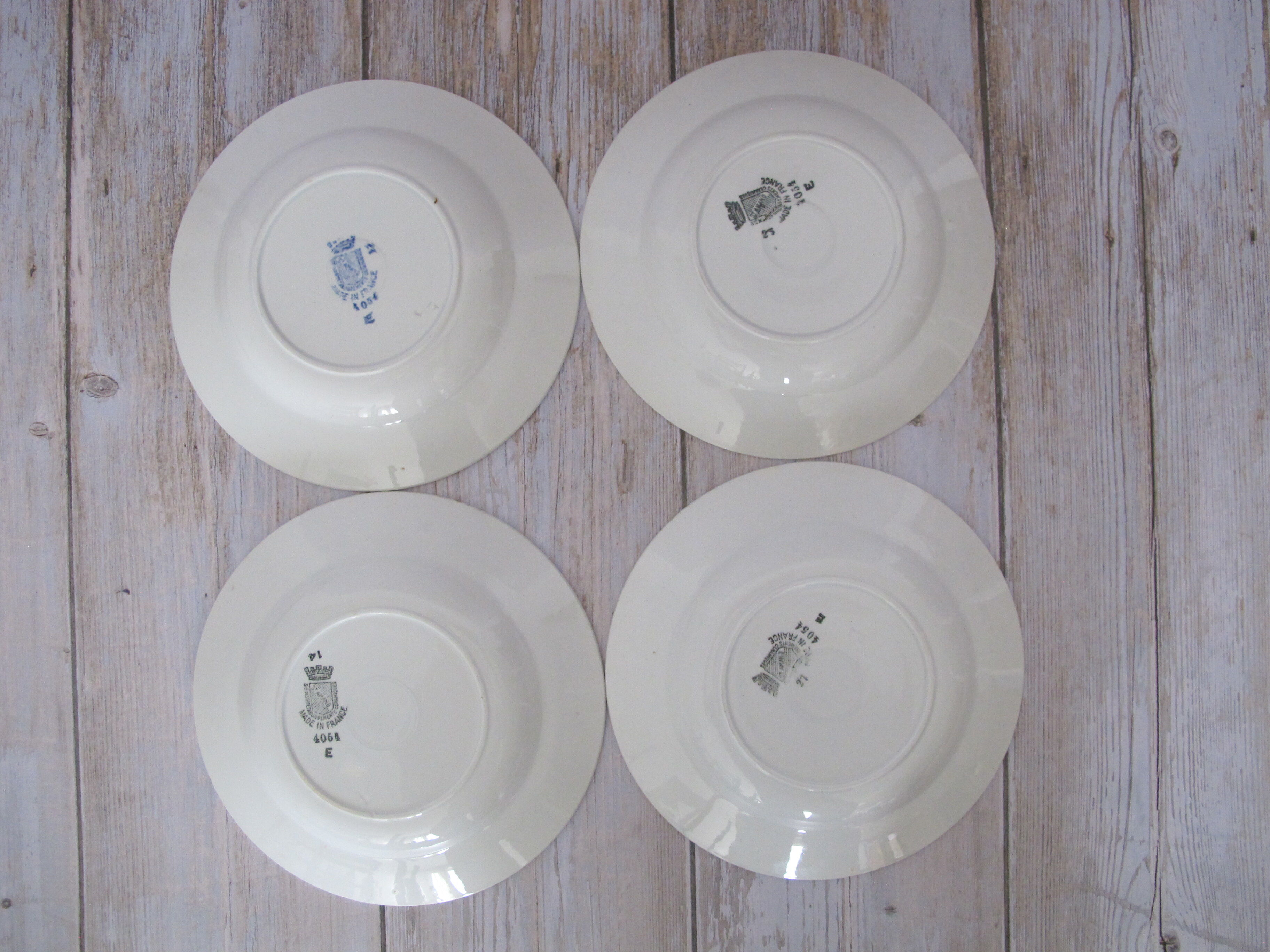 4 plates made of Saint Amand earthenware