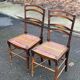 Two 19th-century carved chairs in solid wood and woven rope