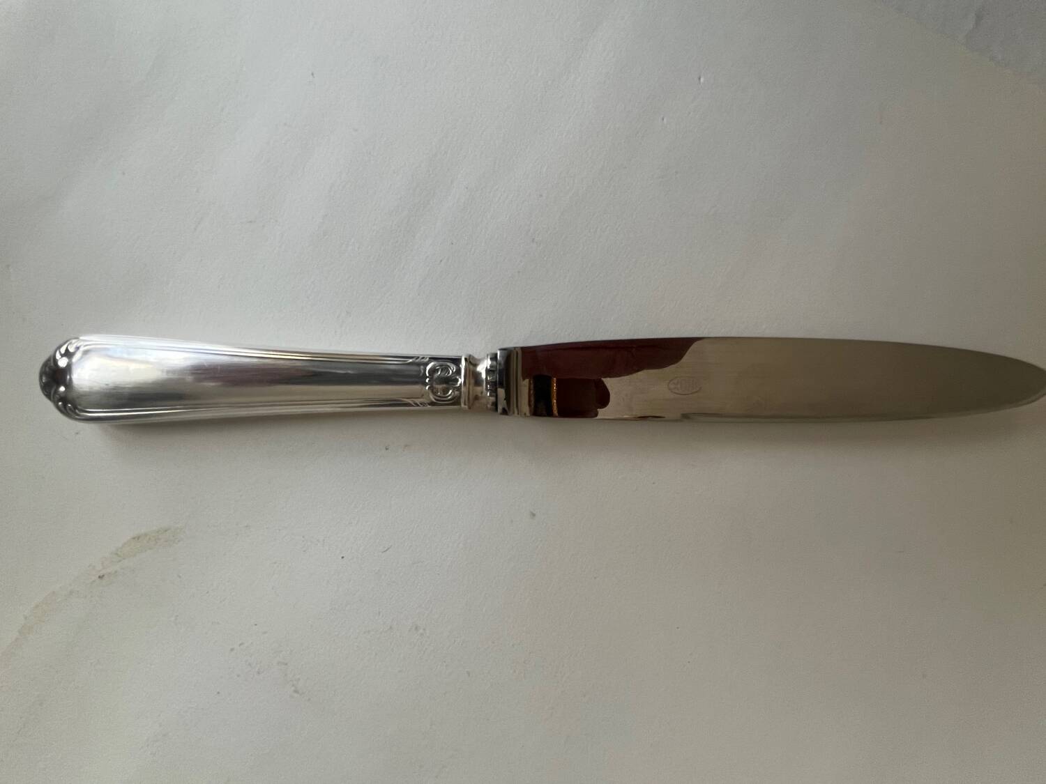 12 silver-plated metal knives