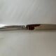 12 silver-plated metal knives