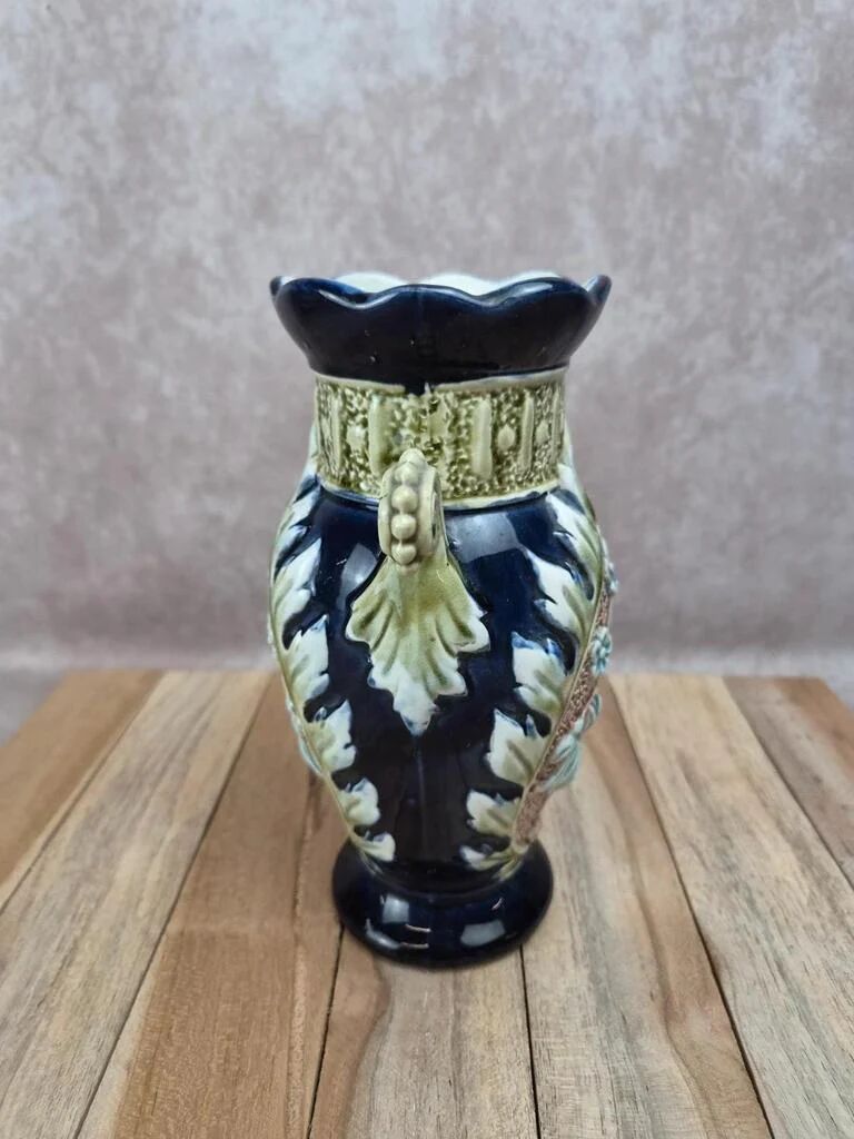 Gustave De Bruyne barbotine vase Fives Lille with an old floral decoration and stylised handles.
