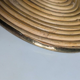 Rattan trivets attributed to Gabriella Crespi.