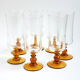 Glasses/flutes with a vintage orange foot