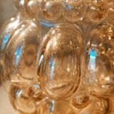 Tulip in iridescent golden glass