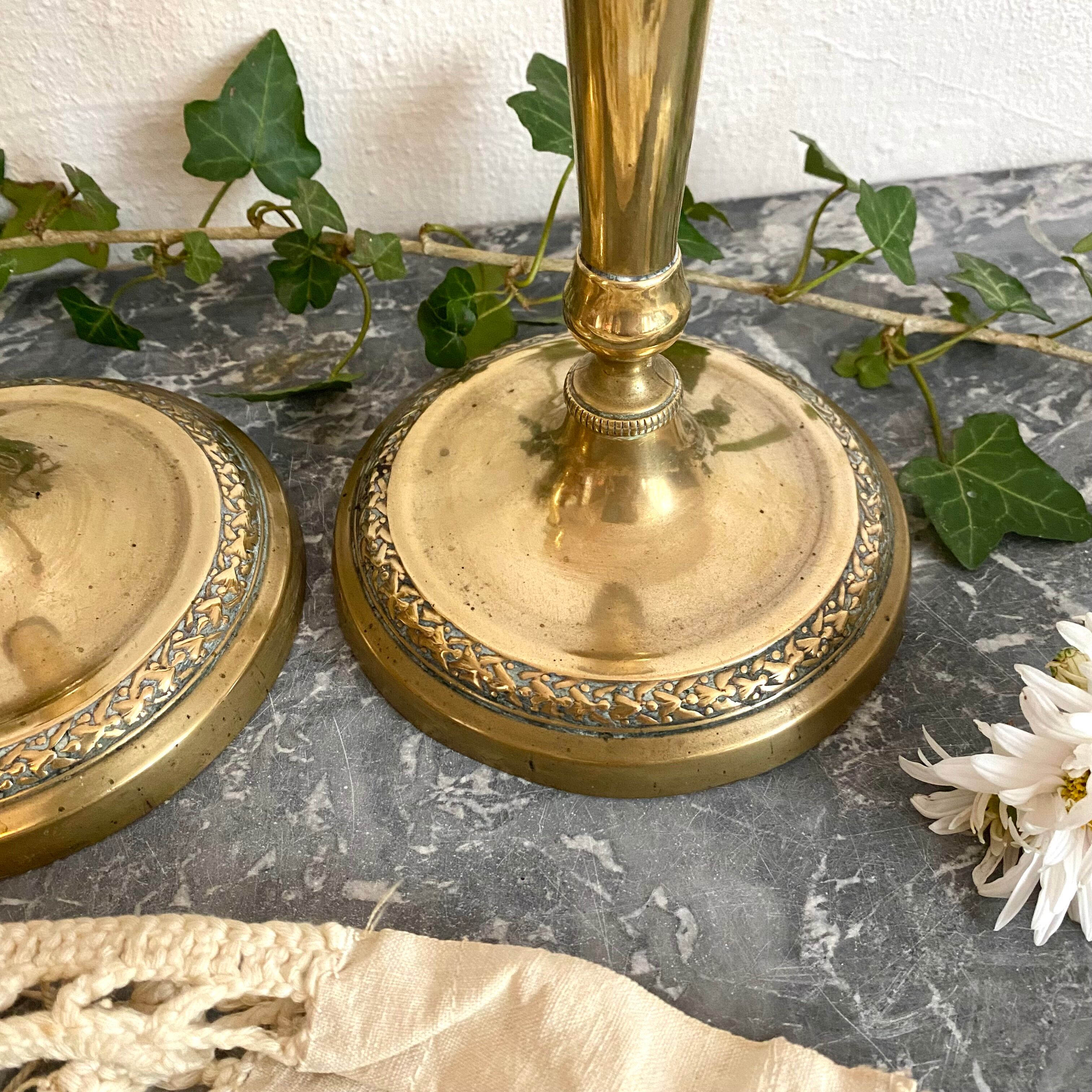 Pair of old gilded brass candlesticks