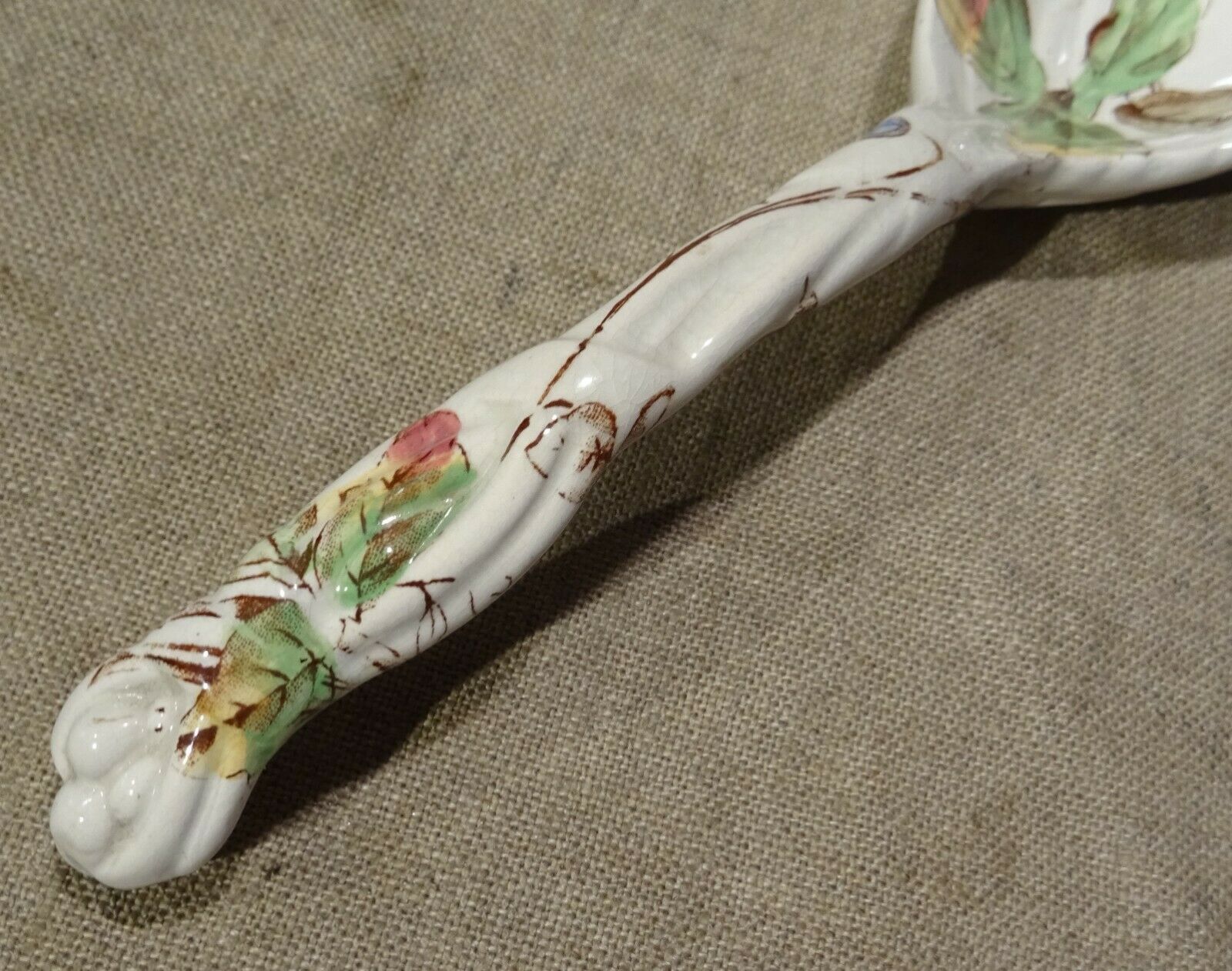 Old spoon with earthenware sauce with floral decoration Longchamp Sarreguemines
