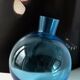 Blue glass ball vase (Portieux?) with tilting bottom