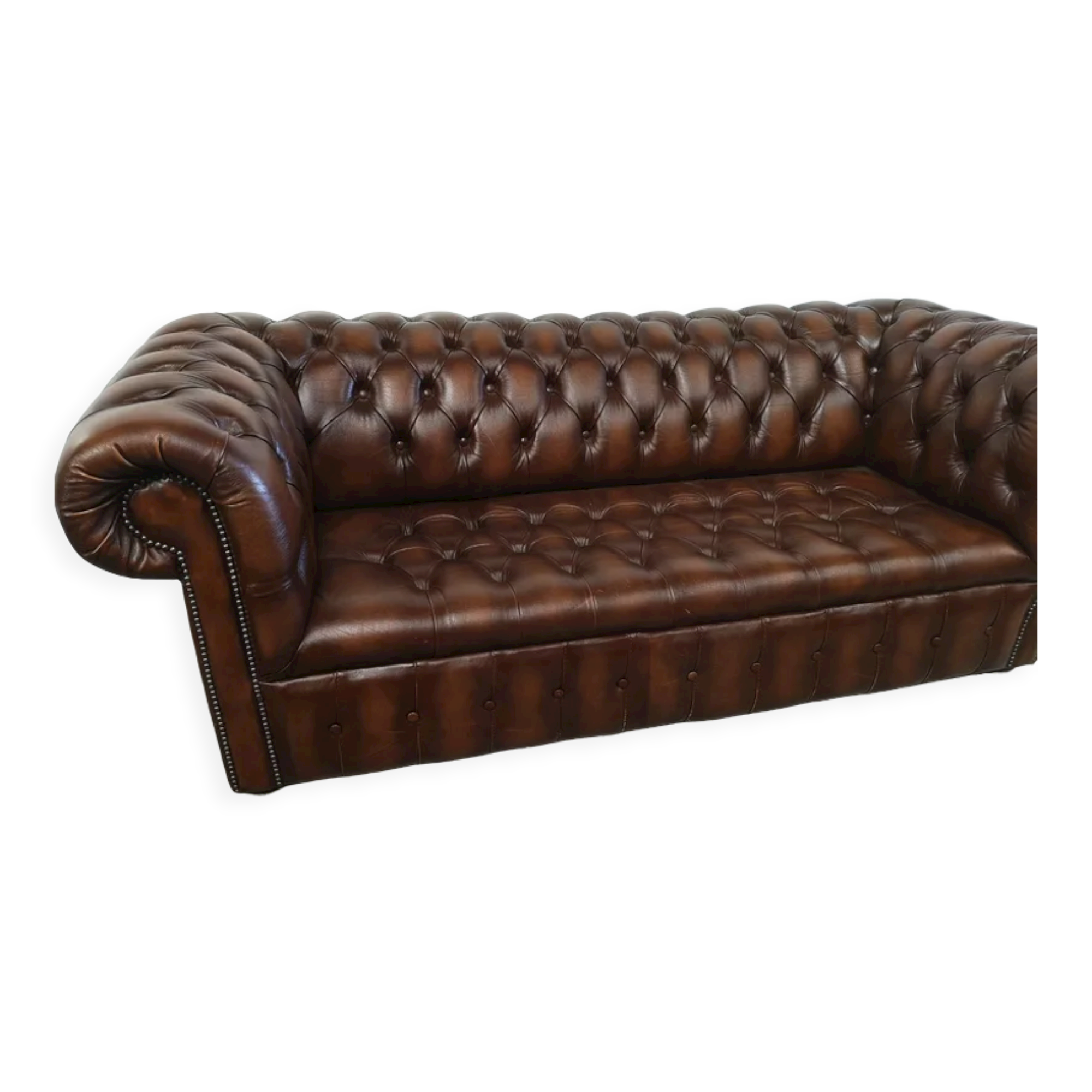 Light brown leather chesterfield sofa upholstered