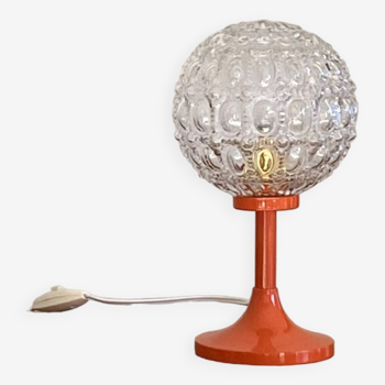 Small antique globe accent lamp in glass and vintage orange metal base