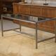 Brushed stainless steel and smoked black glass desk from the 1980s.