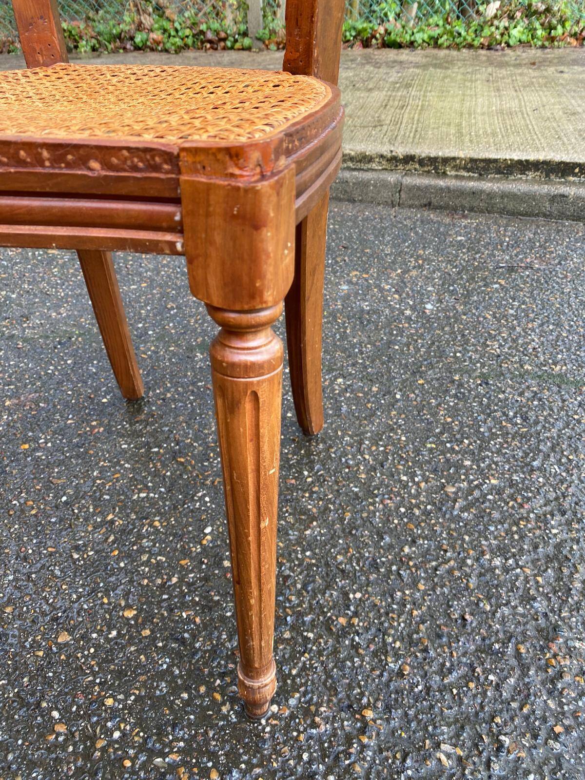 Louis XVI caned chair, solid oak, 20th century.