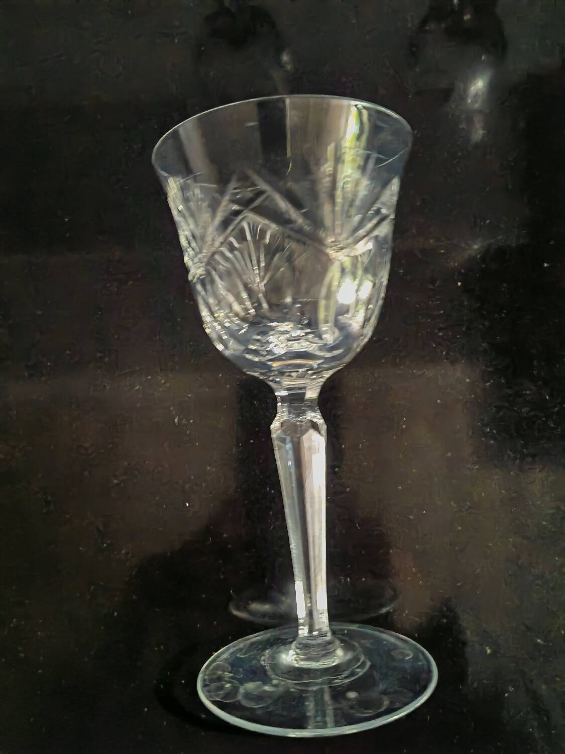 Cut white wine glasses