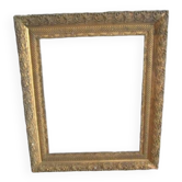 Old frame in wood and gilded stucco