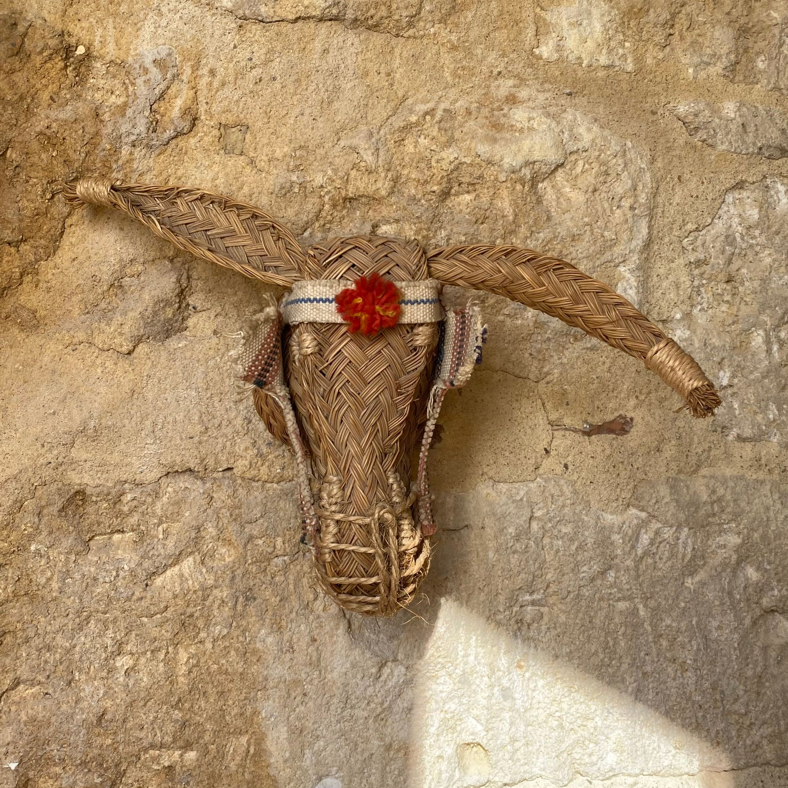 Straw donkey head trophy