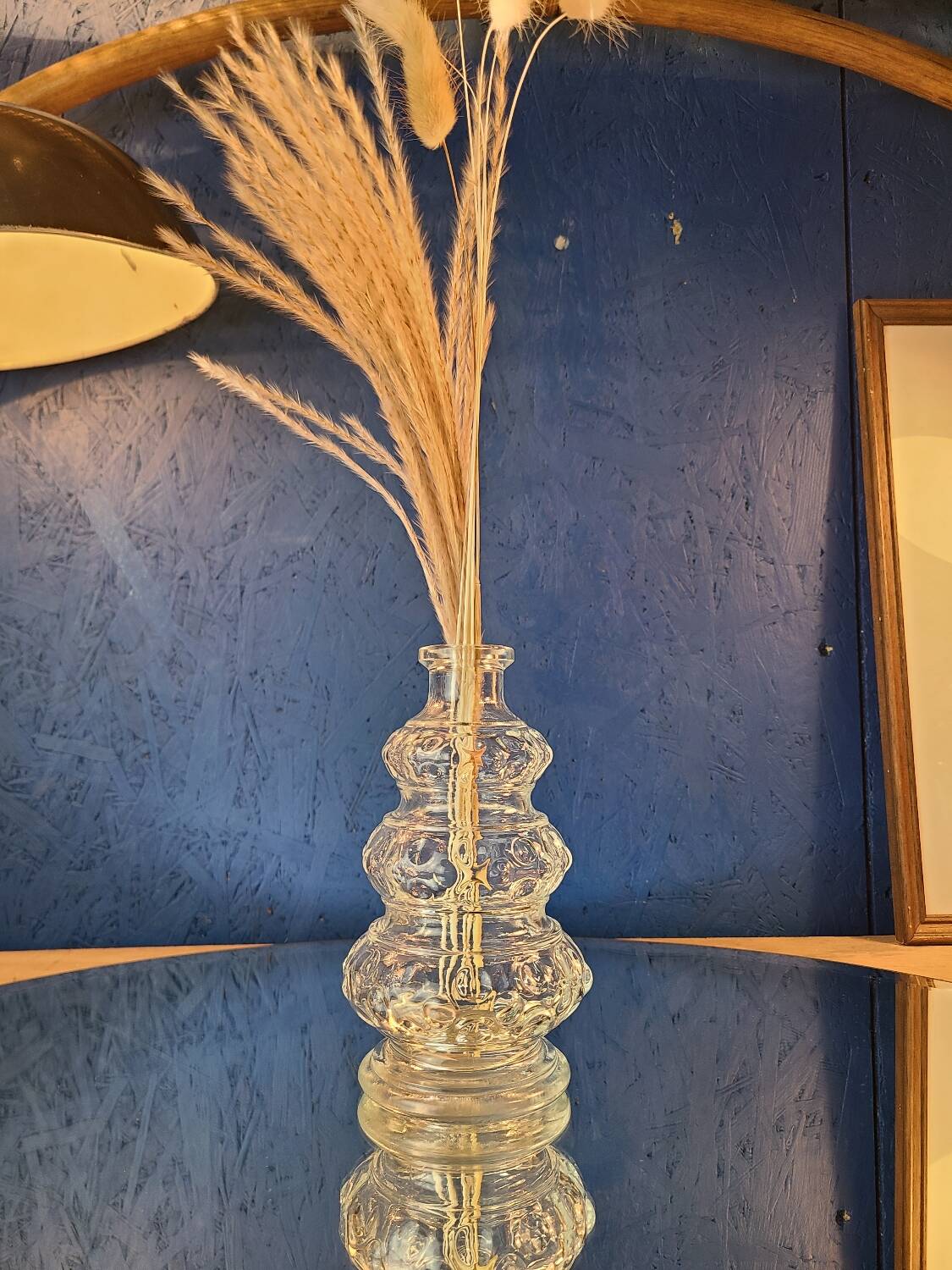 Old 3-branched stone candlestick cut with fine engravings