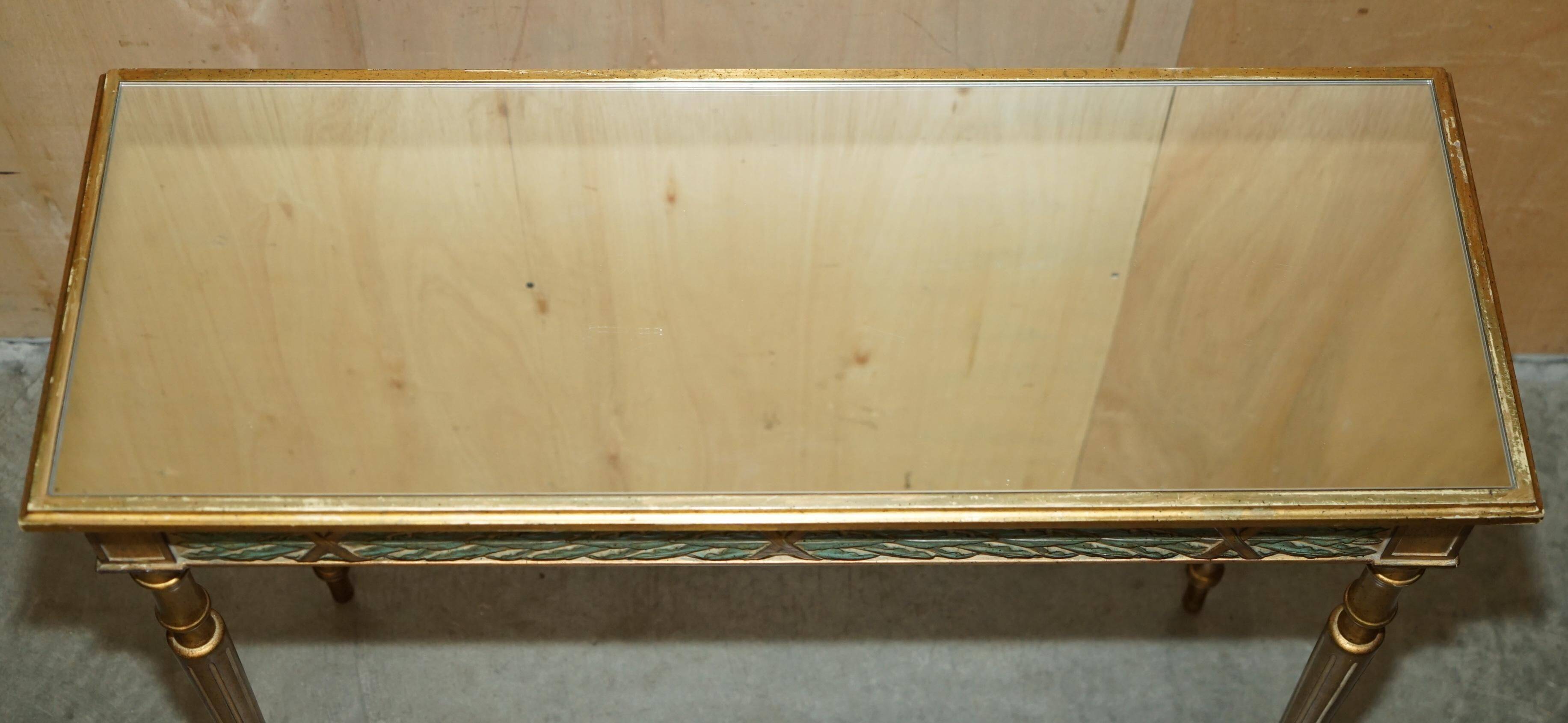 Italian vintage console with a glass mirror top.