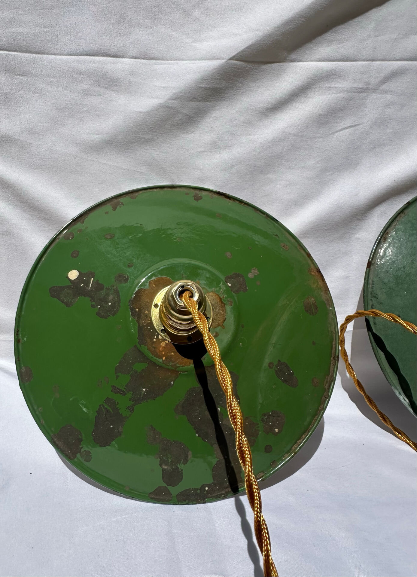 Old suspension pair in green and white enamelled sheet metal.