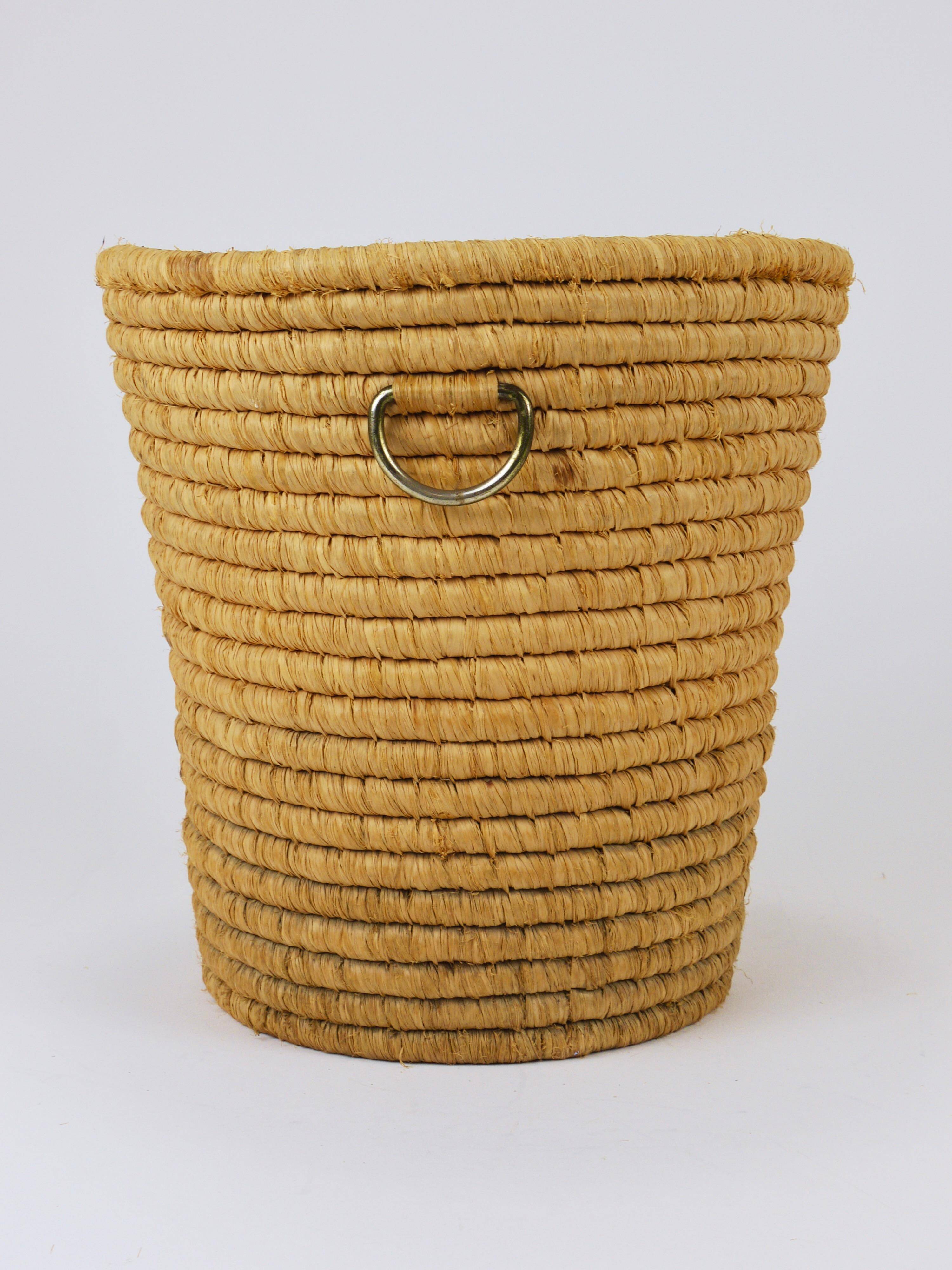 Carl Auböck II paper basket in raffia and brass, umbrella stand, 1950s