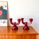 pair of burgundy enameled ceramic candlesticks / candelabras signed 1949