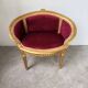 Fauteuil bois doré et velours rouge Louis XVI