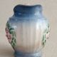 Earthenware milk jug